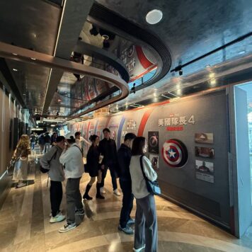 people watching the collection