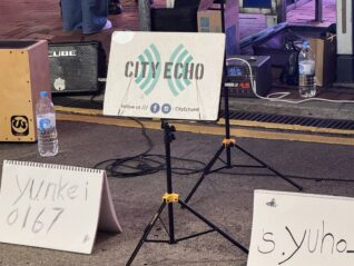 posters and signs with their social media accounts